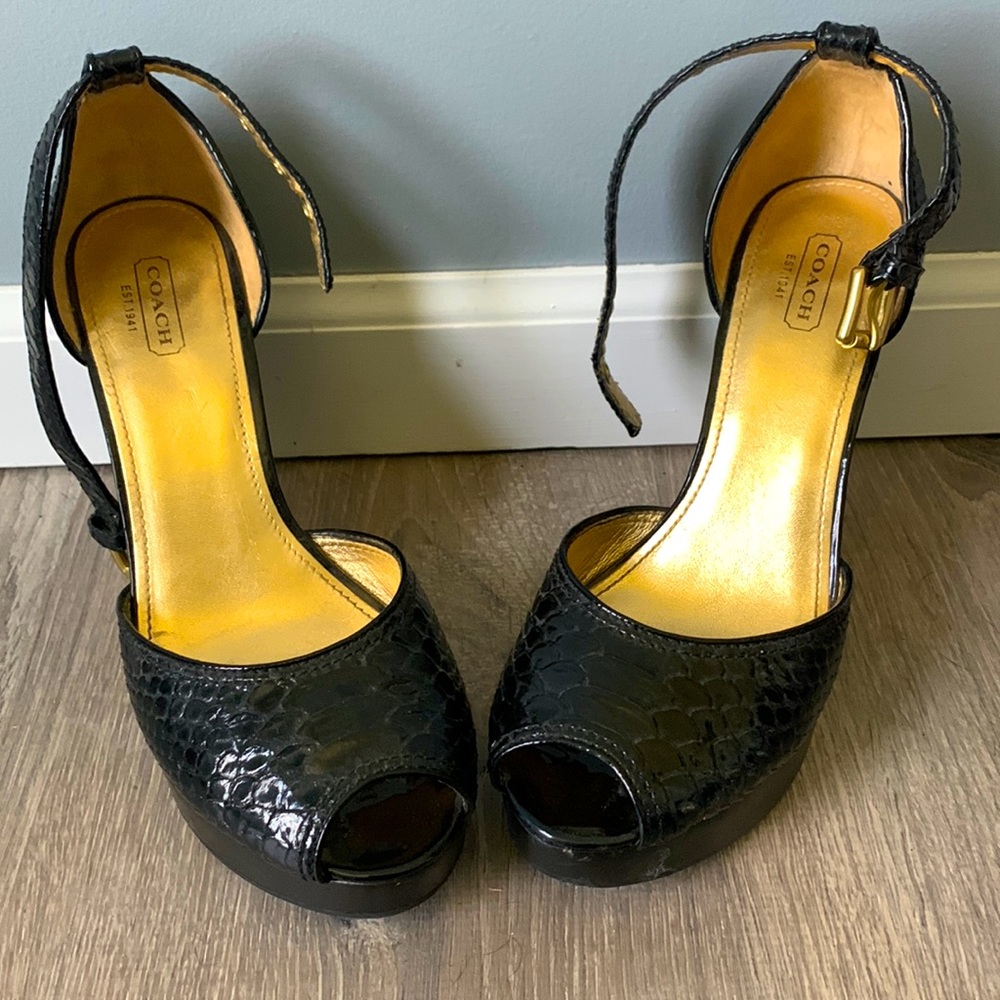 Gently used Coach Black Snake, Peep Toe Wedges!! Hardly worn.